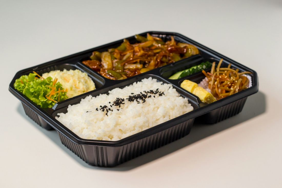 Compartment lunch box with rice, stir-fry and sides